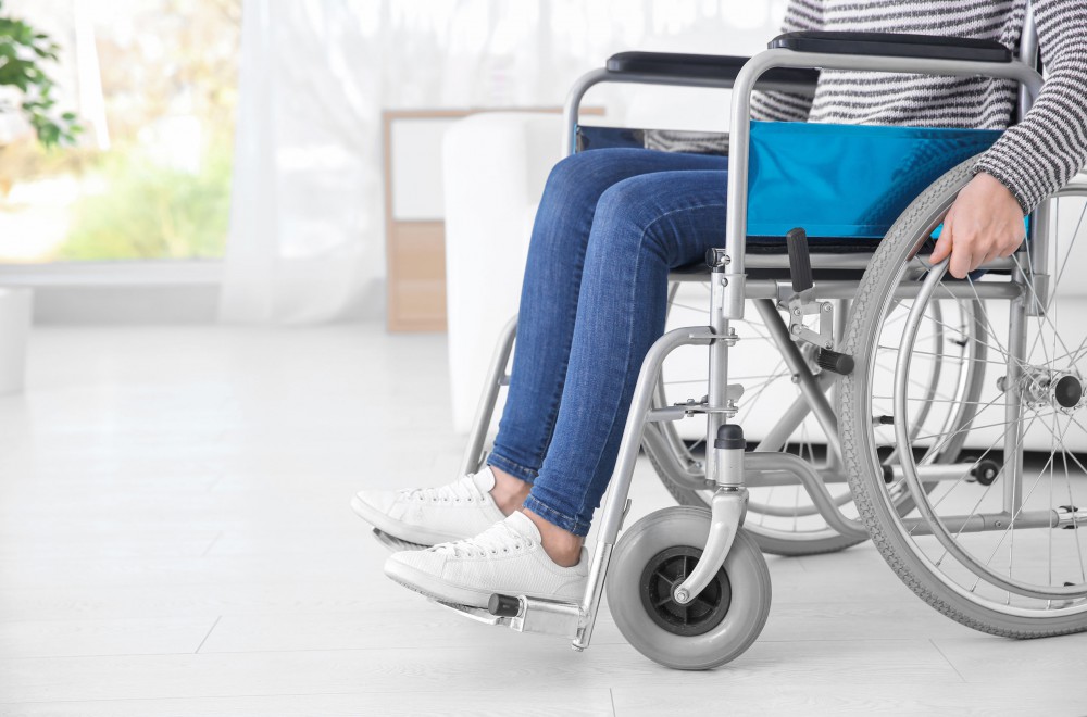 A woman is in a wheelchair.